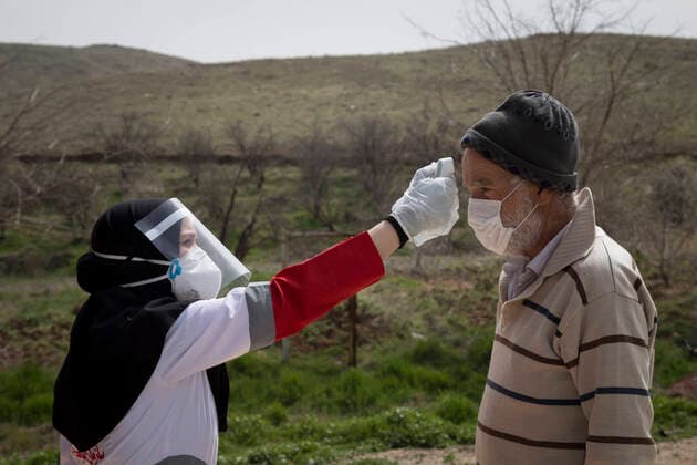 April 6, 2020, Tehran, Iran: Members of the Iranian Red Crescent s Volunteers Organization wearing face masks and protective suit attend the Hameh Sin (Torkaman) mountain village for sanitizing and screening villagers who may be infected by the novel coronavirus (COVID-19) disease in eastern Tehran, Iran. Media reported that Iran is one of the most affected by pandemic COVID-19 disease caused by the SARS-CoV-2 coronavirus. According to the latest reports by the Iranian Ministry of Health, over 3,700 people have died from the coronavirus infection throughout the country. Tehran Iran - ZUMAf146 20200406_zip_f146_042 Copyright: xRouzbehxFouladix