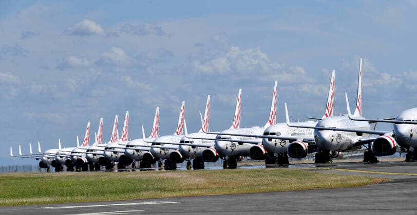 AUSTRALIA CORONAVIRUS COVID-19, Grounded Virgin Australia aircraft are seen parked at Brisbane Airport in Brisbane, Tuesday, April 7, 2020. Brisbane Airport Corporation (BAC) is working with airlines by accommodating up to 100 grounded aircraft free of charge in response to government-mandated travel restrictions that have grounded a significant proportion of Australia s airline fleet because of the Coronavirus (COVID-19). ( NO ARCHIVING, EDITORIAL USE ONLY, NO USE IN BOOKS WITHOUT CONSENT BRISBANE QLD AUSTRALIA  Copyright: xDARRENxENGLANDx 20200407001462125881