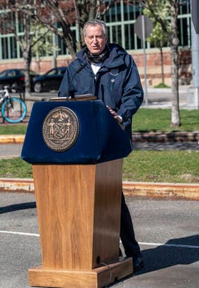 NY: Mayor de Blasio at Brooklyn Yard Mayor de Blasio holds media briefing after visiting production line run by Crye Precision to produce protective gowns at Brooklyn Navy Yard New York New York United States Copyright: LevxRadin