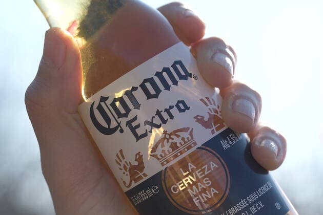 In this photo illustration Corona Extra beer is held on April 5, 2020 in Katwijk, Netherlands.  (125110056)