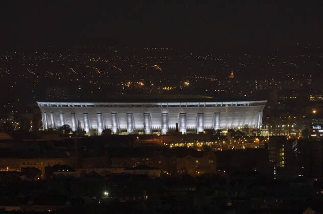 (200407) -- BUDAPEST, April 7, 2020 -- Puskas Arena is illuminated with white light as a show of appreciation for healthcare workers efforts to combat the COVID-19 pandemic in Budapest, Hungary, April 6, 2020. (Photo by Xinhua) HUNGARY-BUDAPEST-COVID-19-WHITE LIGHT ILLUMINATION AttilaxVolgyi 