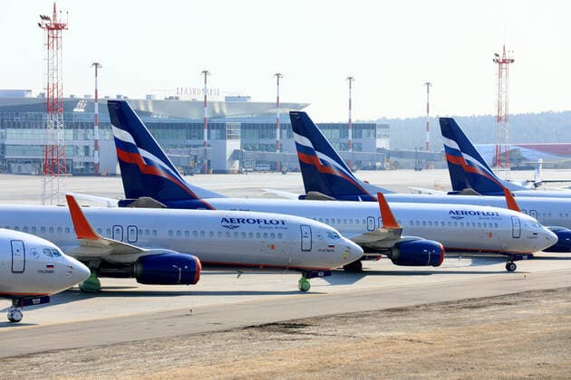 KRASNOYARSK TERRITORY, RUSSIA - APRIL 7, 2020: Aeroflot passenger planes at Krasnoyarsk International Airport. Russia has halted all international flights since March 27, 2020, amid the ongoing COVID-19 coronavirus pandemic, except for repatriation flights. Since April 4, every repatriation flight has to be pre-arranged; Russian citizens arrive at Sheremetyevo Airport only, with the number of passengers per day limited to 500. The passenger traffic in Russian airports has decreased by 89% compared to April 2019. Andrei Samsonov TASS  TS0D4AB9