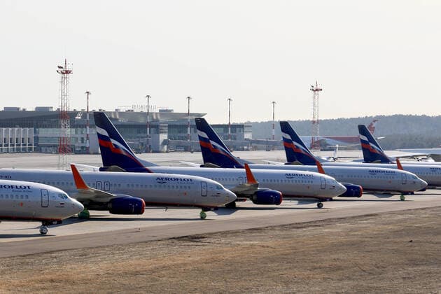 KRASNOYARSK TERRITORY, RUSSIA - APRIL 7, 2020: Aeroflot passenger planes at Krasnoyarsk International Airport. Russia has halted all international flights since March 27, 2020, amid the ongoing COVID-19 coronavirus pandemic, except for repatriation flights. Since April 4, every repatriation flight has to be pre-arranged; Russian citizens arrive at Sheremetyevo Airport only, with the number of passengers per day limited to 500. The passenger traffic in Russian airports has decreased by 89% compared to April 2019. Andrei Samsonov TASS  TS0D4ABC