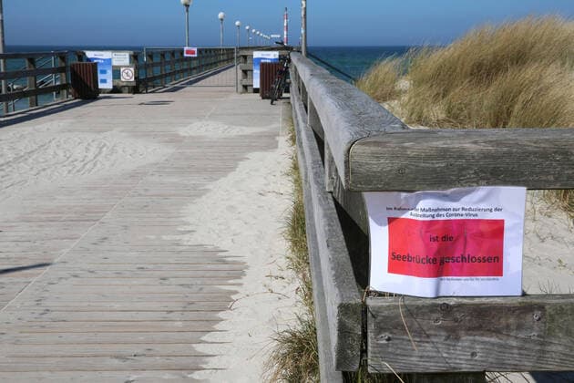 Nothing goes on at the sea View on Tuesday 07 04 2020 of the almost empty Baltic seaside resort Wustrow County Vorpommern Rügen The town currently provides a foretaste of the upcoming Easter weekend According to a regulation of the local government, locals will no longer be allowed to go for long walks on the beac