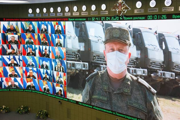 MOSCOW, RUSSIA - APRIL 7, 2020: Attendees during a video conference meeting at the Russian National Defence Management Centre. Alexei Yereshko Russian Defence Ministry Press Office TASS  TS0D4B48