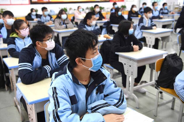 (200407) -- NANNING, April 7, 2020 -- Students attend a class at the No. 2 High School in Nanning, south China s Guangxi Zhuang Autonomous Region, April 7, 2020. Students in the final year of senior and junior high schools returned to school on Tuesday in Guangxi. ) CHINA-GUANGXI-NANNING-SENIOR HIGH SCHOOL STUDENTS-RETURNING TO SCHOOL (CN) ZhouxHua 