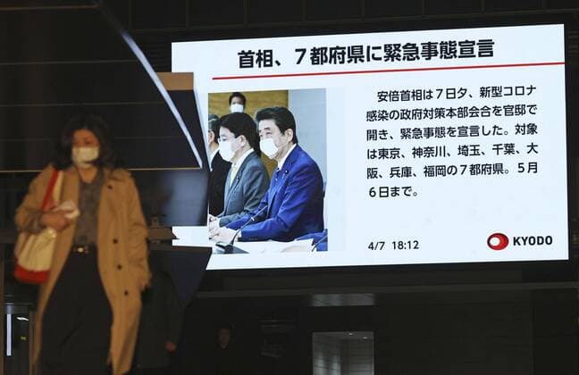 Japan to declare state of emergency Photo taken April 7, 2020, shows a screen in Tokyo s Akihabara area displaying news that Prime Minister Shinzo Abe declared a state of emergency for Tokyo, Osaka and five other prefectures in an effort to curb the spread of the novel coronavirus. 