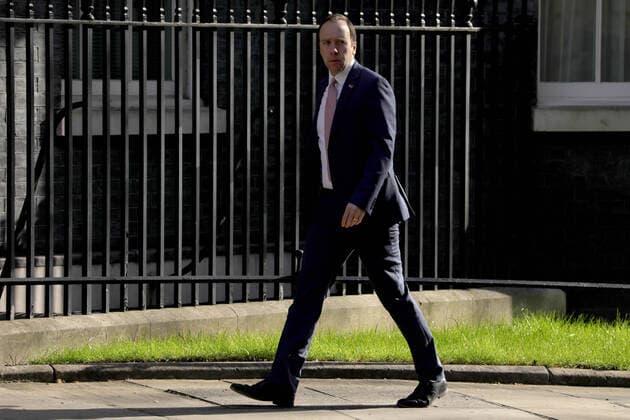 (200407) -- LONDON, April 7, 2020 (Xinhua) -- Matt Hancock, Britain s Secretary of State for Health and Social Care, arrives at 10 Downing street for the COVID-19 committee meeting in London, Britain, April 7, 2020. British Prime Minister Boris Johnson was taken to intensive care on Monday night after his coronavirus symptoms worsened, Downing Street said. Johnson has asked British Foreign Secretary Dominic Raab to deputize for him, a Downing Street spokesman said. (Photo by Tim Ireland Xinhua) BRITAIN-LONDON-COVID-19 