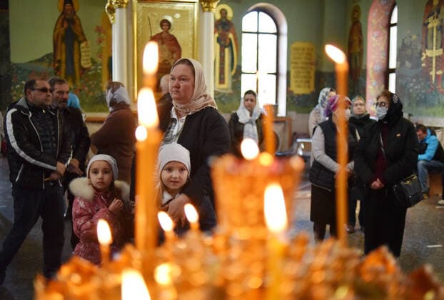 STAVROPOL TERRITORY, RUSSIA - APRIL 7, 2020: Russian Orthodox believers attend a service in the Cathedral of Christ the Saviour Healing An Infirm Man At The Pool of Bethesda, on the feast day of the Annunciation, in the city of Pyatigorsk, during the pandemic of the novel coronavirus (COVID-19). Anton Podgaiko TASS  TS0D4B7E