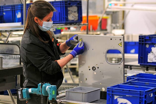 April 7, 2020, Martorell, Barcelona, Spain: A female assembly operator protected with a surgical mask and gloves during the manufacture of OxyGENs..Spanish automobile company, SEAT has shifted a team of 150 workers from manufacturing cars to making respirators that help COVID-19 patients, reusing mechanical parts like the windshield wiper motor. The respirator is called OxyGEN. Martorell Spain - ZUMAs197 20200407_zaa_s197_088 Copyright: xRamonxCostax