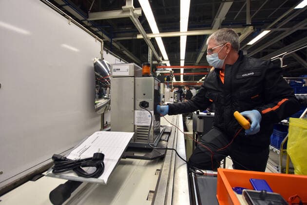 April 7, 2020, Martorell, Barcelona, Spain: A quality controller protected with a surgical mask and gloves during the manufacture of OxyGENs..Spanish automobile company, SEAT has shifted a team of 150 workers from manufacturing cars to making respirators that help COVID-19 patients, reusing mechanical parts like the windshield wiper motor. The respirator is called OxyGEN. Martorell Spain - ZUMAs197 20200407_zaa_s197_091 Copyright: xRamonxCostax