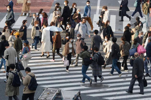 April 7, 2020, Tokyo, Japan: Pedestrians wearing face masks walk through the famous scramble crossing in Shibuya. Japanese Prime Minister Shinzo Abe declared a state of emergency for Tokyo and six other prefectures (Kanagawa, Saitama, Chiba, Osaka, Hyogo and Fukuoka) responding to the coronavirus pandemic. Tokyo Japan - ZUMAm191 20200407_zap_m191_021 Copyright: xRodrigoxReyesxMarinx