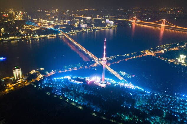 (200408) -- WUHAN, April 8, 2020 -- Aerial photo taken on April 7, 2020 shows a night view in Wuhan, central China s Hubei Province. Wuhan, the megacity in central China, started lifting outbound travel restrictions from Wednesday after almost 11 weeks of lockdown to stem the spread of COVID-19. ) CHINA-HUBEI-WUHAN-NIGHT VIEW(CN) XiaoxYijiu 