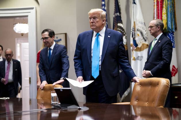 President Donald Trump arrives with Treasury Secretary Steve Mnuchin to participate in a Small Business Relief Update, at the White House in Washington, DC on Tuesday, April 7, 2020. President Donald Trump announced in March that companies affected by the coronavirus will be given $50 billion more in low-interest loans federally guaranteed by the Small Business Administration. Pool photo by Doug Mills  WAX20200407203 DOUGxMILLS
