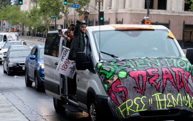 April 7, 2020, Los Angeles, California, U.S: Amid fears of the coronavirus pandemic, protesters drive their cars and trucks in a noisy procession in otherwise mostly silent, empty streets in downtown Los Angeles, Tuesday, April 7, 2020. The demonstration is designed to persuade county leaders to release the incarcerated from detention centers into homes where they can be monitored away from jails that have become breeding grounds for the virus. Los Angeles U.S. - ZUMAc68_ 20200407_zaf_c68_002 Copyright: xRingoxChiux