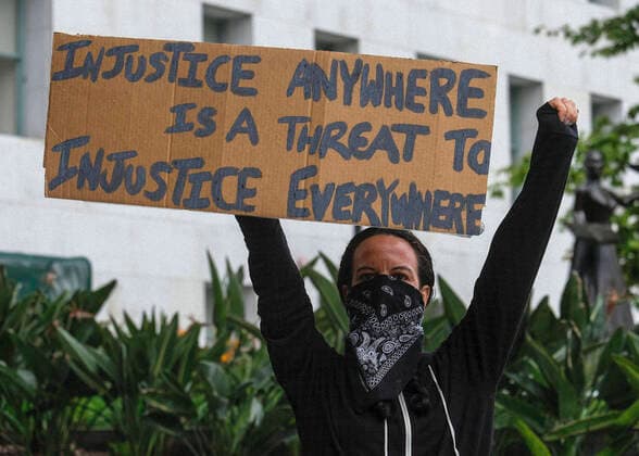 April 7, 2020, Los Angeles, California, U.S: Amid fears of the coronavirus pandemic, protesters drive their cars and trucks in a noisy procession in otherwise mostly silent, empty streets in downtown Los Angeles, Tuesday, April 7, 2020. The demonstration is designed to persuade county leaders to release the incarcerated from detention centers into homes where they can be monitored away from jails that have become breeding grounds for the virus. Los Angeles U.S. - ZUMAc68_ 20200407_zaf_c68_006 Copyright: xRingoxChiux