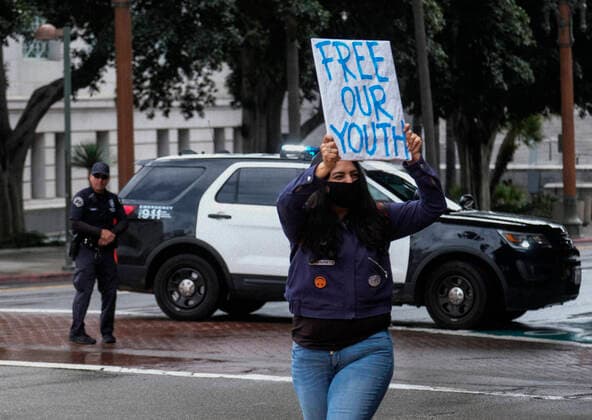 April 7, 2020, Los Angeles, California, U.S: Amid fears of the coronavirus pandemic, protesters drive their cars and trucks in a noisy procession in otherwise mostly silent, empty streets in downtown Los Angeles, Tuesday, April 7, 2020. The demonstration is designed to persuade county leaders to release the incarcerated from detention centers into homes where they can be monitored away from jails that have become breeding grounds for the virus. Los Angeles U.S. - ZUMAc68_ 20200407_zaf_c68_009 Copyright: xRingoxChiux