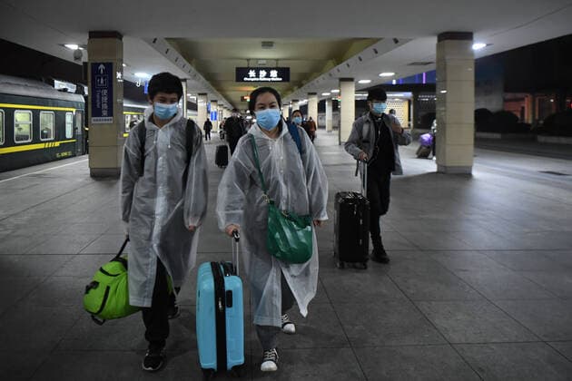 (200408) -- CHANGSHA, April 8, 2020 -- Two passengers (1st L and 2nd L) from Wuhan get off train K81 at Changsha Railway Station in Changsha, central China s Hunan Province, early April 8, 2020. The train K81, which started from Xi an of northwest China s Shaanxi Province and is heading for Guangzhou in south China s Guangdong Province, made a stop to pick up 442 passengers at Wuchang Railway Station in Wuhan early Wednesday, the first one since the city lifted its outbound travel restrictions. ) CHINA-CHANGSHA-WUHAN-TRAIN-ARRIVAL (CN) XuexYuge 