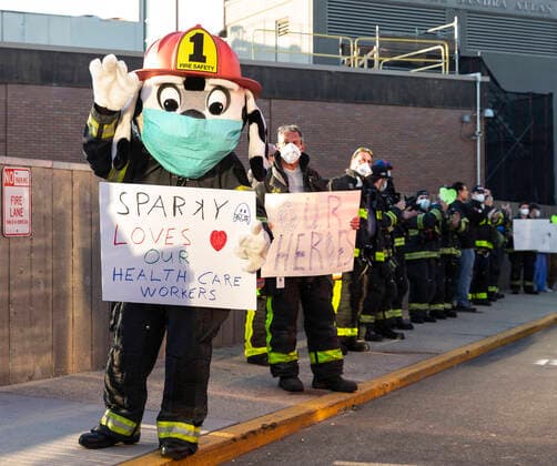 NY: Nassau County first responders salute medics Nassau County first responders line up to salute heroes from front lines of COVID-19 pandemic at North Shore University Hospital Manhasset New York United States Copyright: LevxRadin