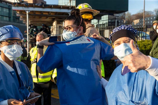 NY: Nassau County first responders salute medics Nassau County first responders line up to salute heroes from front lines of COVID-19 pandemic at North Shore University Hospital where medical personnel arrives for night shift Manhasset New York United States Copyright: LevxRadin