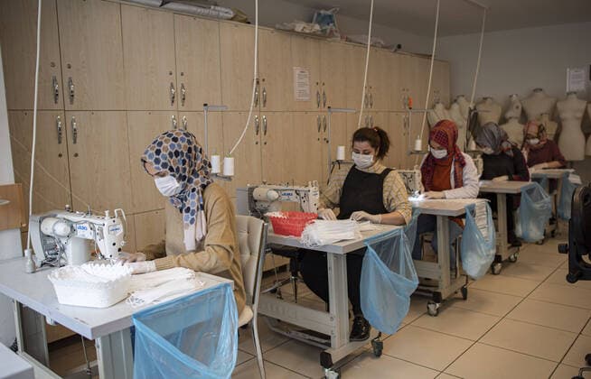 Students of the Ismek Colpan Ilhan Industrial College produce masks during coronavirus COVID 19 at Moda district in Istanbul , Turkey. Copyright: AkinxCeliktas 16715508