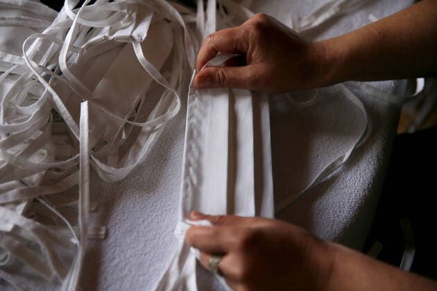 SOCHI, RUSSIA - APRIL 8, 2020: A face mask sewn by the Barsegyan family. The Barsegyans receive materials from the Sochi city hall, sew face masks and give them to volunteers and healthcare workers attending patients under quarantine. Dmitry Feoktistov TASS  TS0D4DA5