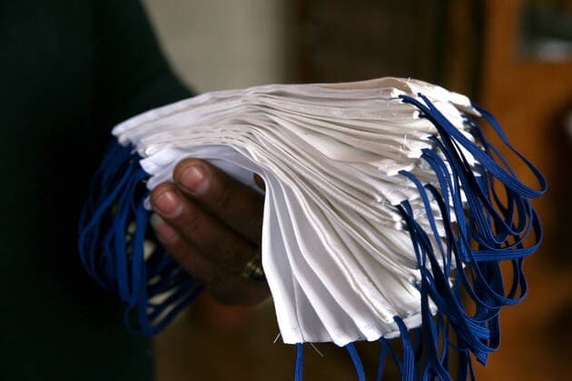SOCHI, RUSSIA - APRIL 8, 2020: Face masks sewn by the Barsegyan family. The Barsegyans receive materials from the Sochi city hall, sew face masks and give them to volunteers and healthcare workers attending patients under quarantine. Dmitry Feoktistov TASS  TS0D4DA7