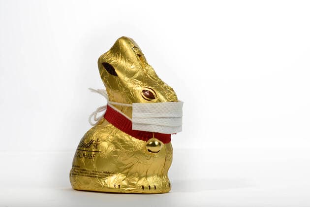 Symbol picture Easter during the Corona crisis, a chocolate Easter bunny with mouthguard, Stuttgart, Baden Württemberg, Germany Refrigerator bulging