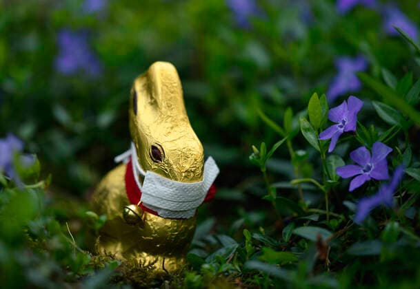 Symbol picture Easter during the Corona crisis, a chocolate Easter bunny with mouthguard, Stuttgart, Baden Württemberg, Germany Refrigerator filled to bursting