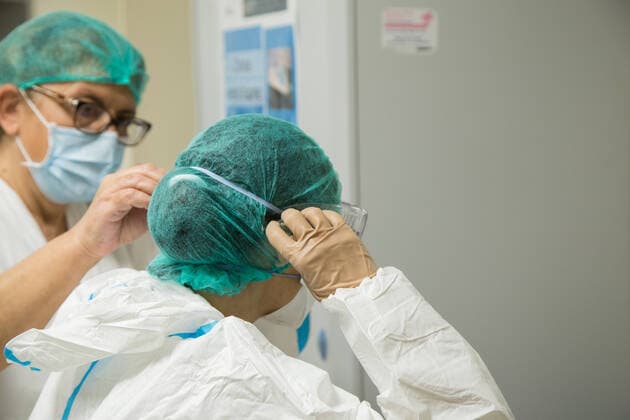 Rome: Dressing of nurses in a COVID-19 Hospital Dressing procedures for nurses in the clean area of pavilion D of the San Filippo Neri hospital in Rome, used as a Covid hospital Roma RM Italy Copyright: MatteoxNardone