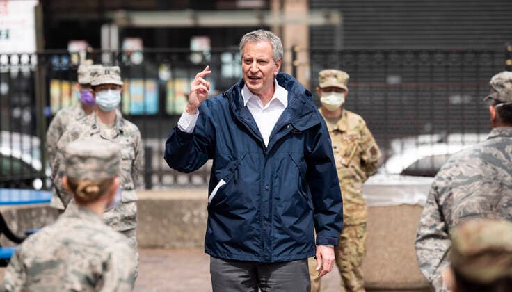 April 8, 2020, Bronx, NY, U.S: April 8, 2020 - Bronx, NY, United States: New York City Mayor BILL DE BLASIO (D) welcoming members of the United States Air Force who have been deployed to Lincoln Hospital. The mayor is seen here in a courtyard of Lincoln Hospital with U.S. Air Force personnel. Bronx U.S. - ZUMAb161 20200408_zap_b161_007 Copyright: xMichaelxBrochsteinx