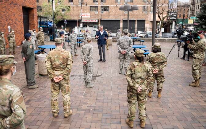 April 8, 2020, Bronx, NY, U.S: April 8, 2020 - Bronx, NY, United States: New York City Mayor BILL DE BLASIO (D) welcoming members of the United States Air Force who have been deployed to Lincoln Hospital. The mayor is seen here in a courtyard of Lincoln Hospital with U.S. Air Force personnel. Bronx U.S. - ZUMAb161 20200408_zap_b161_008 Copyright: xMichaelxBrochsteinx