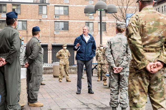 April 8, 2020, Bronx, NY, U.S: April 8, 2020 - Bronx, NY, United States: New York City Mayor BILL DE BLASIO (D) welcoming members of the United States Air Force who have been deployed to Lincoln Hospital. The mayor is seen here in a courtyard of Lincoln Hospital with U.S. Air Force personnel. Bronx U.S. - ZUMAb161 20200408_zap_b161_016 Copyright: xMichaelxBrochsteinx