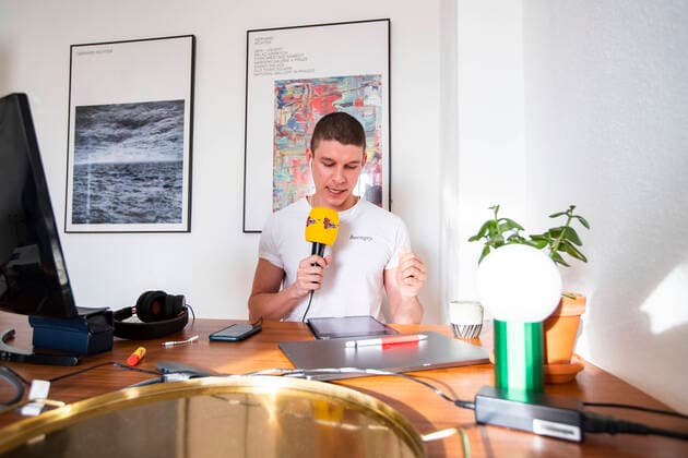 Journalist, blogger and radio presenter Florian Prokop broadcasts a radio report from his home office in Berlin on 8 April 2020 To sl