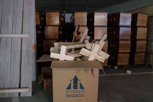 April 8, 2020, Barcelona, Spain: A box with crosses in the Collserola mortuary parking lot. This space has been converted into a morgue due to the increase in deaths of Covid19...Coronavirus outbreak in Spain has already killed 14,659 people. The large number of deaths has forced Eurocoffin, the main coffin factory in Catalonia, to triple its production, from 50 to 150 coffins per day. Isolation and quarantine prevent family members from gettting infected or infect others. In Spain today, the pandemic leaves numbers of 146,690 infected and 48,021 recovered. Barcelona Spain - ZUMAs197 20200408_zaa_s197_159 Copyright: xPabloxMiranzox