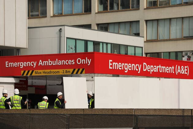 (200409) -- LONDON, April 9, 2020 (Xinhua) -- Workers erect barriers outside St Thomas Hospital where British Prime Minister Boris Johnson remains in intensive care in London, Britain on April 8, 2020. During Wednesday s Downing Street daily press briefing, Chancellor of the Exchequer Rishi Sunak said Prime Minister Boris Johnson s condition is improving and remains in intensive care. Johnson was admitted to St Thomas Hospital in London with persistent symptoms on Sunday night, 10 days after testing positive for COVID-19. He was moved into intensive care on Monday night after his coronavirus symptoms worsened. (Photo by Tim Ireland Xinhua) UK-LONDON-COVID-19-PM-SITUATION 