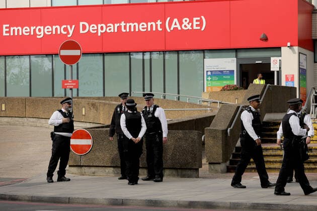 (200409) -- LONDON, April 9, 2020 (Xinhua) -- Police stand guard St Thomas Hospital where British Prime Minister Boris Johnson remains in intensive care in London, Britain on April 8, 2020. During Wednesday s Downing Street daily press briefing, Chancellor of the Exchequer Rishi Sunak said Prime Minister Boris Johnson s condition is improving and remains in intensive care. Johnson was admitted to St Thomas Hospital in London with persistent symptoms on Sunday night, 10 days after testing positive for COVID-19. He was moved into intensive care on Monday night after his coronavirus symptoms worsened. (Photo by Tim Ireland Xinhua) UK-LONDON-COVID-19-PM-SITUATION 