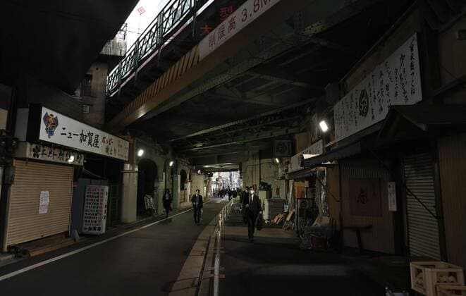 Tokyo after state-of-emergency declaration Commuters walk in front of closed restaurants near JR Shimbashi Station in Tokyo on April 8, 2020, a day after Prime Minister Shinzo Abe declared a state of emergency over the coronavirus crisis. 
