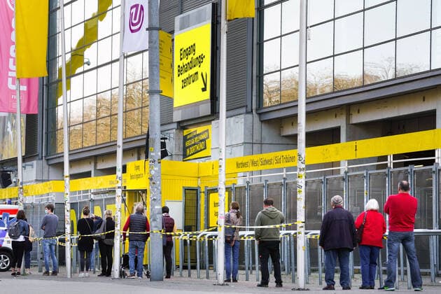 Dortmund, 9 April 2020 A temporary corona test and treatment centre has been set up in part of the Signal Iduna Park Westfalenstadion of the Bundesliga club BvB Borussia Dortmund Citizens can be tested for the novel COVID 19 coronavirus virus here Photo Patients waiting at a distance in front of the entrance to the treatment centre