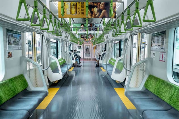 April 9, 2020, Tokyo, Japan: People wearing a face mask for protection reads on an almost empty JR train..The Japan government declared a state of emergency to cover Tokyo, Osaka, also covers Saitama, Kanagawa, Chiba, Hyogo and Fukuoka prefectures on the 7th April and will continue until at least May 6. Tokyo governor Yuriko Koike has asked residents to self-isolate as COVID-19 coronavirus spreads. Tokyo Japan - ZUMAs197 20200409_zaa_s197_075 Copyright: xViolaxKamx