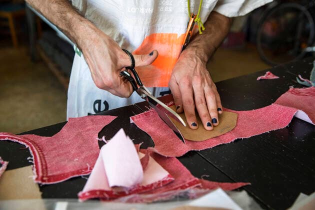 Andrea Bonfini of Berlin fashion label Fade Out produces face masks, currently mainly for friends and acquaintances, in his studio in Berlin on April 9, 2020 The measures decided by the federal and state governments to slow down the spread of the coronavirus SARS CoV 2 will continue before Easter The debate about compulsory mouth protection and the effectiveness of the masks