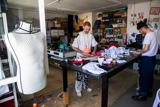 Andrea Bonfini L and his partner Tobi R of Berlin fashion label Fade Out produce face masks, currently mainly for friends and acquaintances, in his studio in Berlin on April 9, 2020 The measures decided by the federal and state governments to slow down the spread of the coronavirus SARS CoV 2 will continue before Easter The debate about compuls