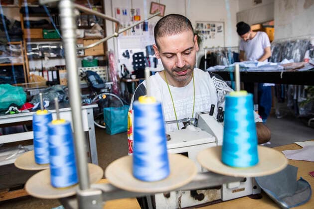 Andrea Bonfini C and his partner Tobi R of Berlin fashion label Fade Out produce face masks, currently mainly for acquaintances and friends, in his studio in Berlin on April 9, 2020 The measures decided by the federal and state governments to slow down the spread of the coronavirus SARS CoV 2 will continue before Easter The debate about compuls