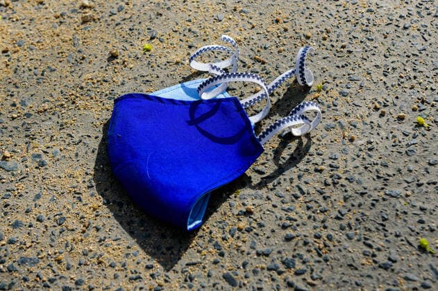 April 9, 2020, Berlin, Berlin, Germany: A self sewn protective face mask lies on the floor. German Federal Government and the heads of government of the federal states adopted guidelines for further restricting social contacts in the public sector in view of the corona epidemic in Germany. Currently, meetings of more than two people are not allowed. As far as possible, a minimum distance of 1.5 meters must be maintained. Violations are punishable by a fine. Berlin Germany - ZUMAs172 20200409_zap_s172_015 Copyright: xJanxScheunertx