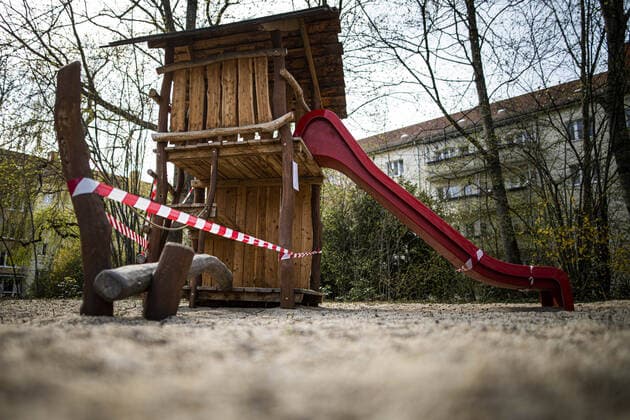 A slide with a barrier tape, taken on a playground in Dresden, 09 04 2020 Due to the spread of the coronavirus, there are restrictions on exit throughout Germany Dresden Germany Copyright: xFlorianxGaertner photothek.netx
