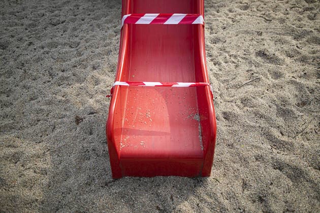 A slide with a barrier tape, taken on a playground in Dresden, 09 04 2020 Due to the spread of the coronavirus, there are restrictions on exit throughout Germany Dresden Germany Copyright: xFlorianxGaertner photothek.netx