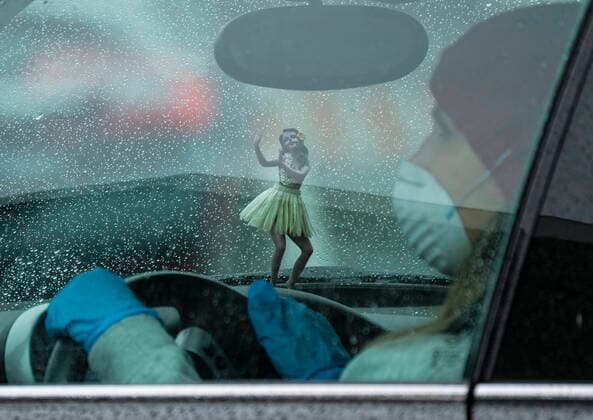 April 9, 2020, Los Angeles, California, U.S: A motorist waits in line in her car during a drive-through COVID-19 testing in a parking lot of the Rose Bowl in Pasadena, California on Thursday, April 9, 2020. Los Angeles U.S. - ZUMAc68_ 20200409_zaf_c68_006 Copyright: xRingoxChiux