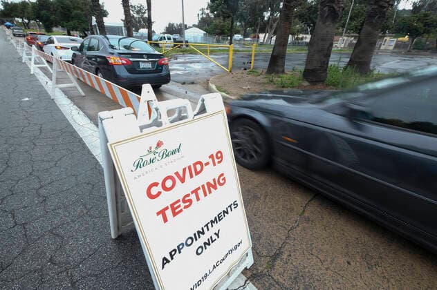 April 9, 2020, Los Angeles, California, U.S: Motorists wait in their vehicles during a drive-through COVID-19 testing in a parking lot of the Rose Bowl in Pasadena, California on Thursday, April 9, 2020. Los Angeles U.S. - ZUMAc68_ 20200409_zaf_c68_018 Copyright: xRingoxChiux