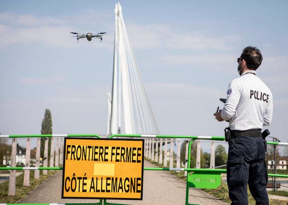 A French policeman uses a drone to check the surroundings of the closed German-French border in Strasbourg, eastern France, on April 9, 2020, on the 24th day of a strict lockdown in France to stop the spread of COVID-19 NEWS : Covid 19 Coronavirus en France - Strasbourg - 09 04 2020 ElyxandroCEGARRA PANORAMIC 