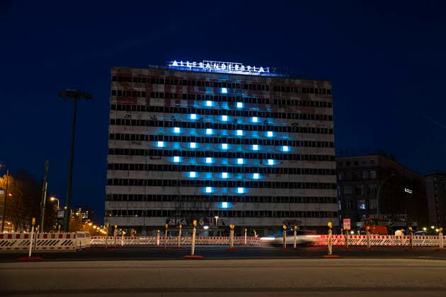 Illumination of windows from an abandoned building near Alexanderplatz in the form of a heart in Berlin on April 9, 2020 In order to slow down the spread of the coronavirus SARS CoV 2, the federal and state governments decided